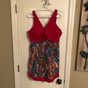 Full swimsuit with hidden boy short bottoms.